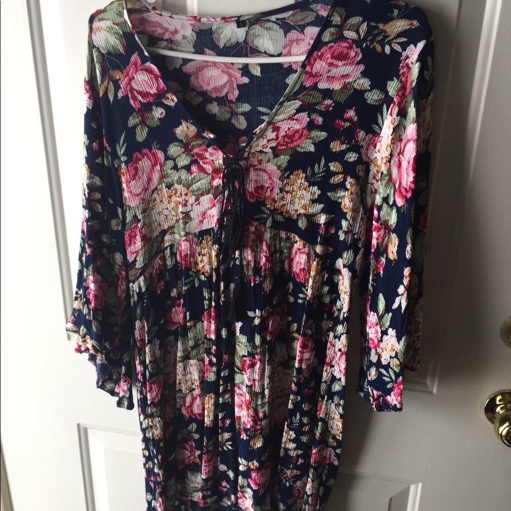Floral dress with bell sleeves.
